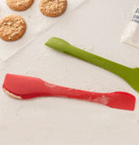 The red Narrow Spatula "Switchit" sits well with the green one on the countertop for making cookies. 