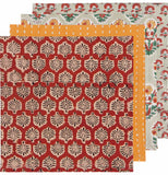 Four napkins overlapping each other in a stack. The first napkin is red with a black and white fern design. The second napkins is orange with white dots. The third napkins is gray with yellow, green, and red flowers. The fourth napkins is gray with red and green flowers.