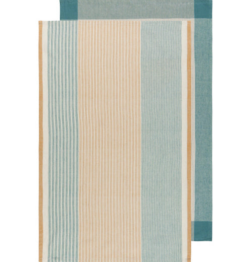 Two tea towels that mostly overlap, showing the front and back of the same design. Both designs are stripped. The front design is a pale yellow and blue. The back design is a saturated blue and white.