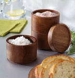Set of 2 stacking salt round boxes showing seasonings inside the boxes.