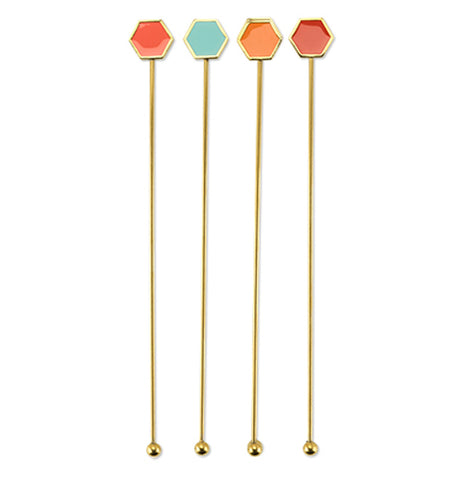 Gold toned stirring sticks with enameled geometric top fitting : coral, red, turquoise, and orange in package.