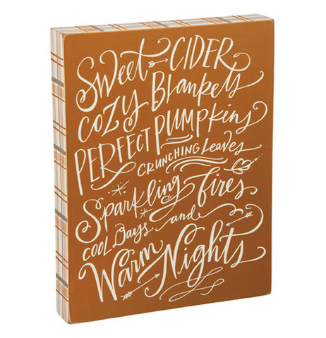 Box Sign that is brown with fall phrases written in white cursive letters