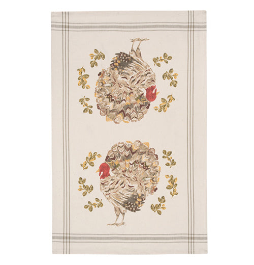 This image shows a cram colored tea towel with two decorative turkeys in the middle.  
