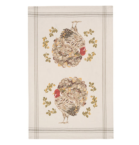 This image shows a cram colored tea towel with two decorative turkeys in the middle.  