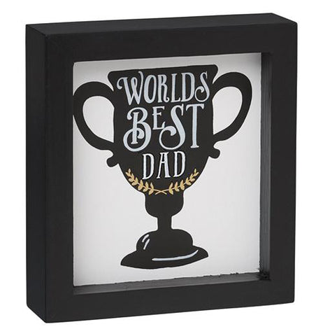 Black Box Frame That Says "World's Best Dad" Written On A Championship Cup